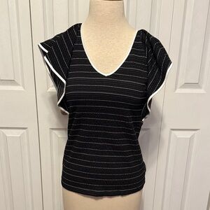 Black and white ruffle sleeve top. Size small